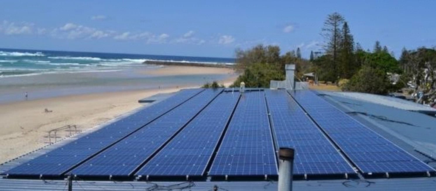Commercial rooftop solar installation at a beachfront site