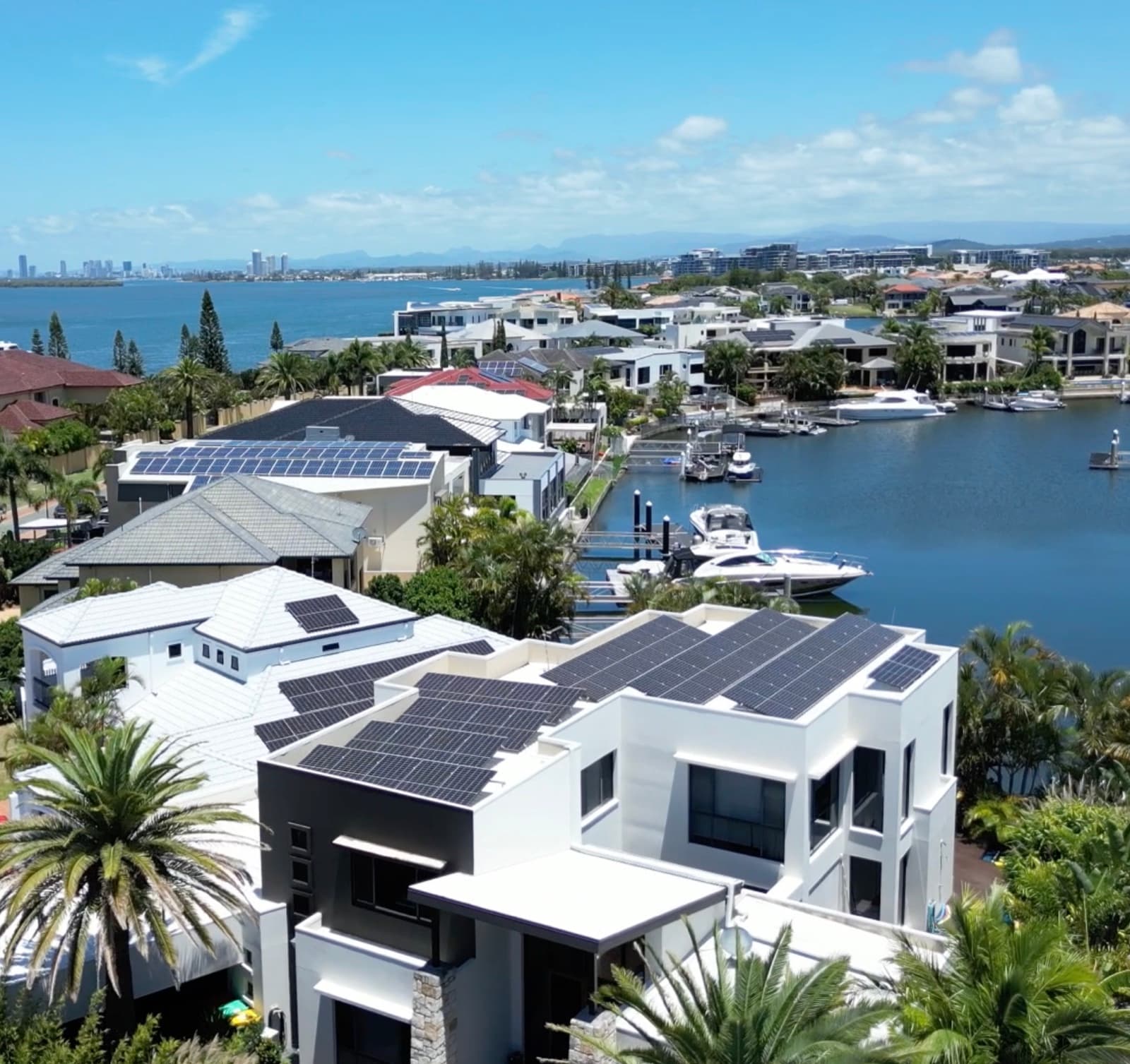 Solar panels installed on a modern Gold Coast waterfront home